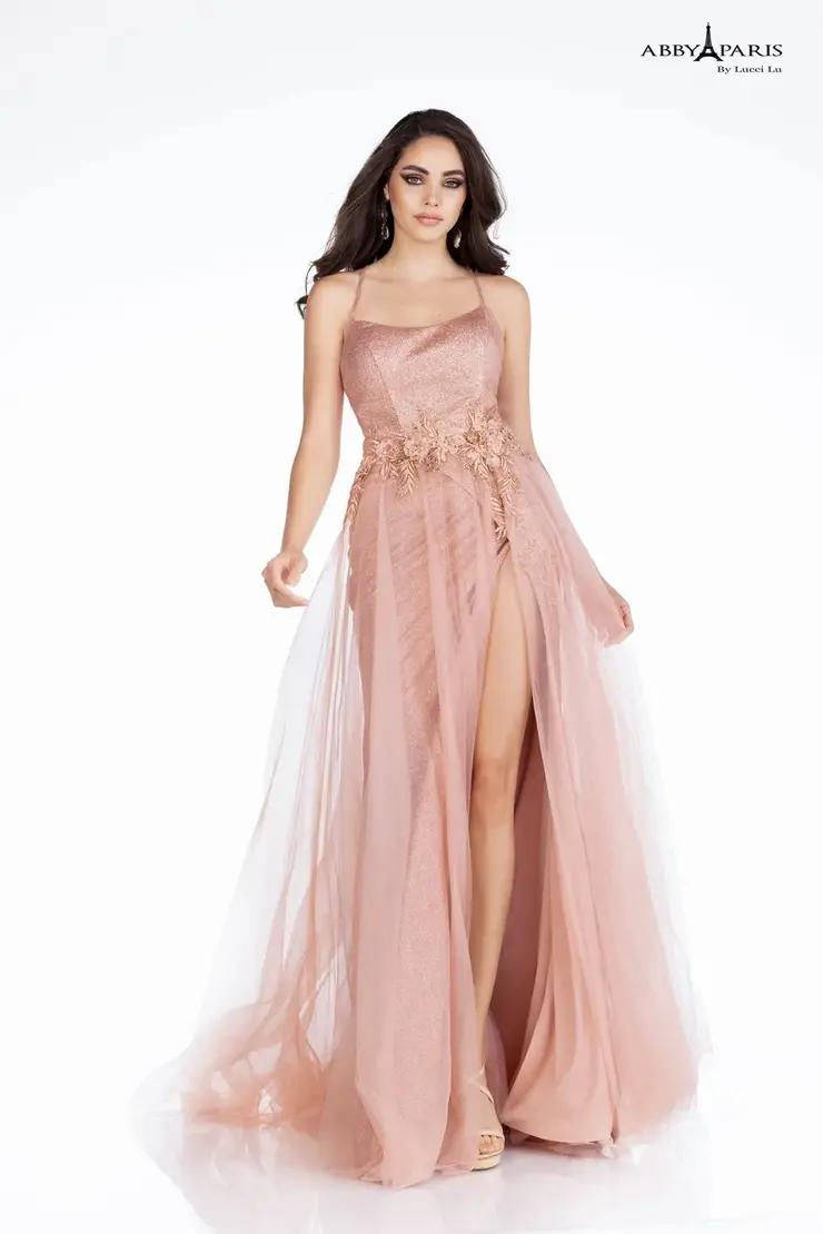 Model wearing a Abby Paris Prom rosy gown