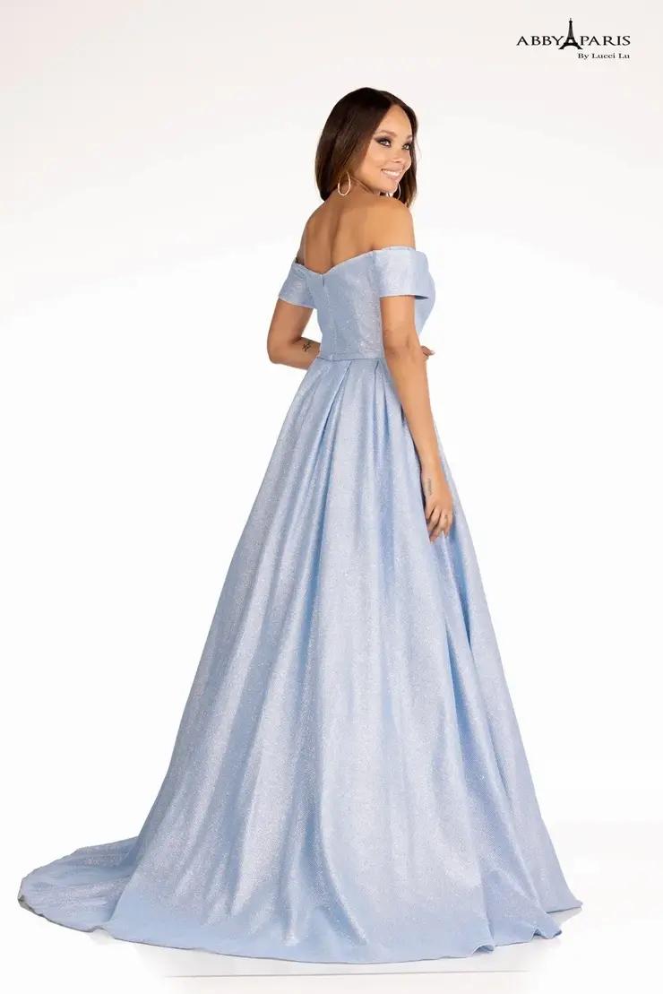 Model wearing a Abby Paris Prom blue gown