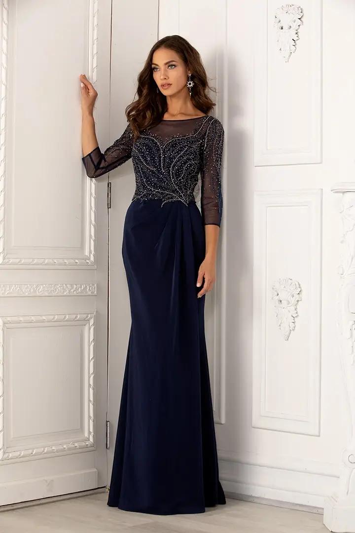 Model wearing a Lucci Lu Mother of the Bride dark blue dress