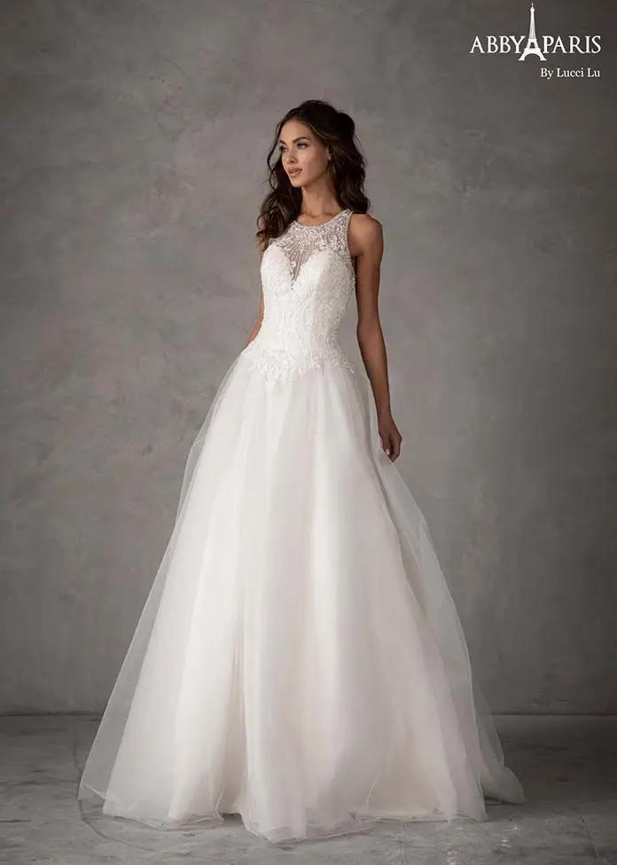 Model wearing a Lucci Lu Abby Paris white bridal gown