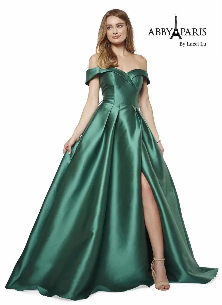 Model wearing a Abby Paris Prom green gown